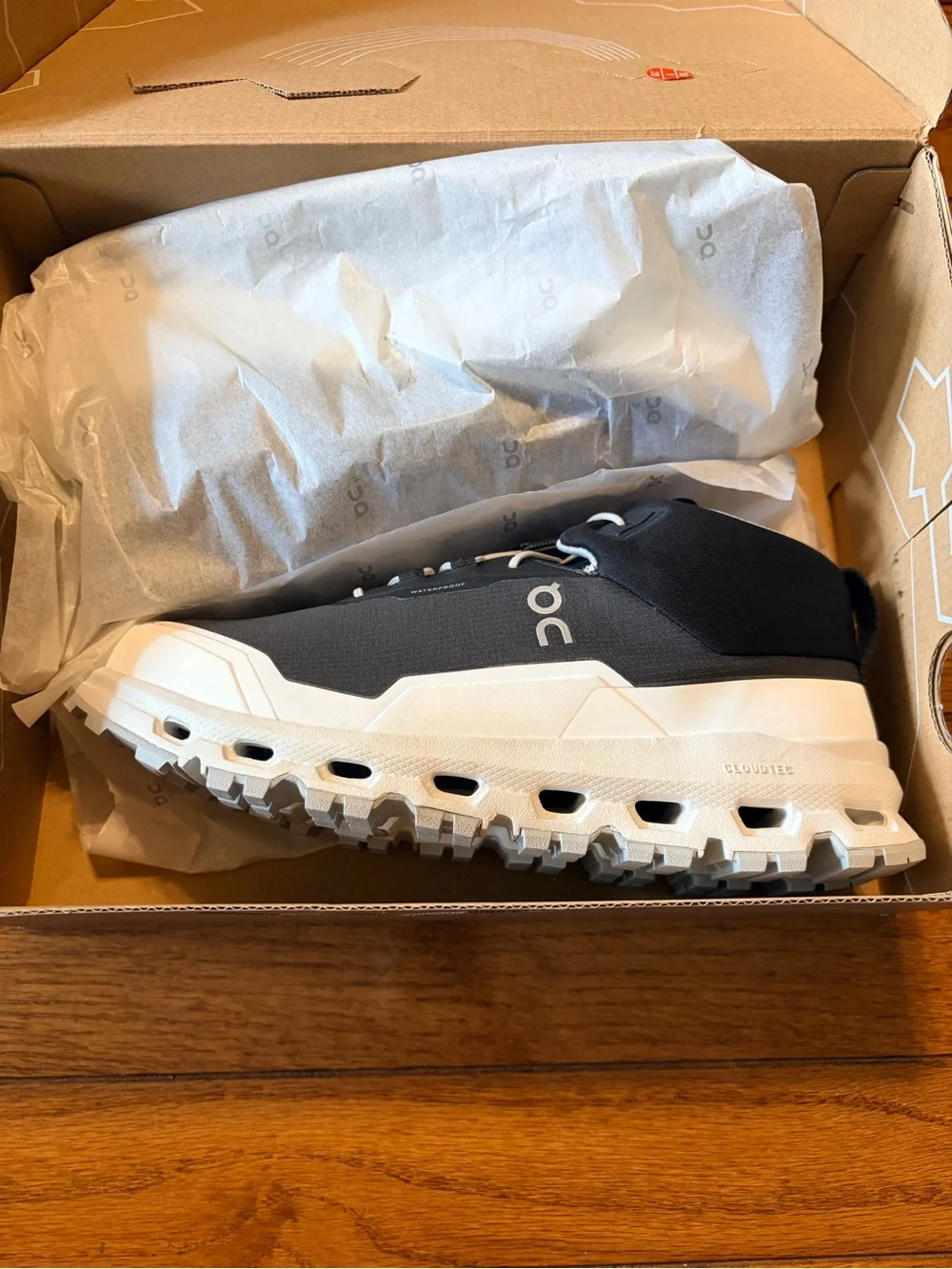 On Running Youth 4.5 Cloudhero mid waterproof Trail Shoes in Black and White